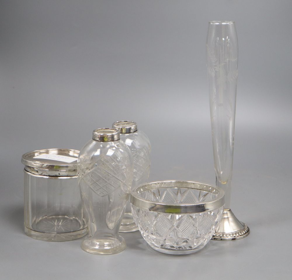 Five assorted silver mounted glass items, including vases, bowl and lidded jar, largest 25.7cm.